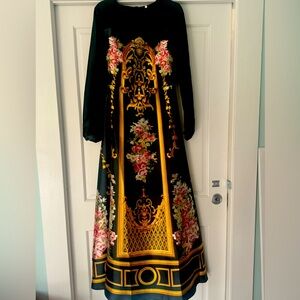 Beautiful baroque print gown with sheer sleeves. Size 12 - 14